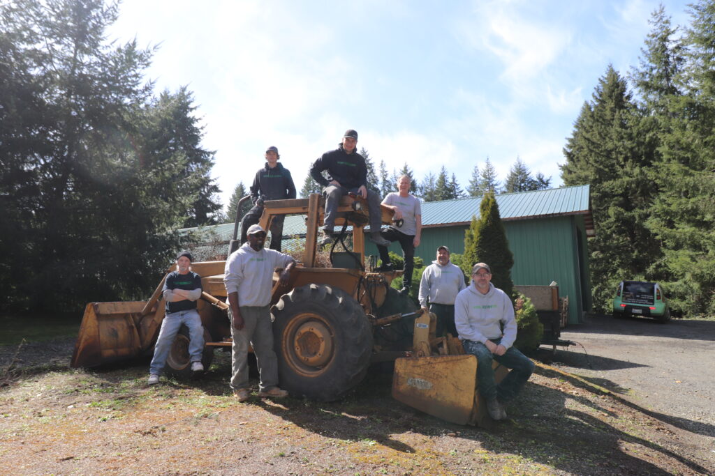 The Interior Design Center team on a tractor